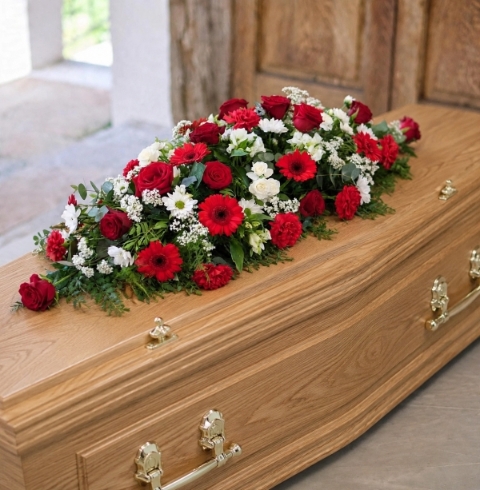 Red and white casket spray